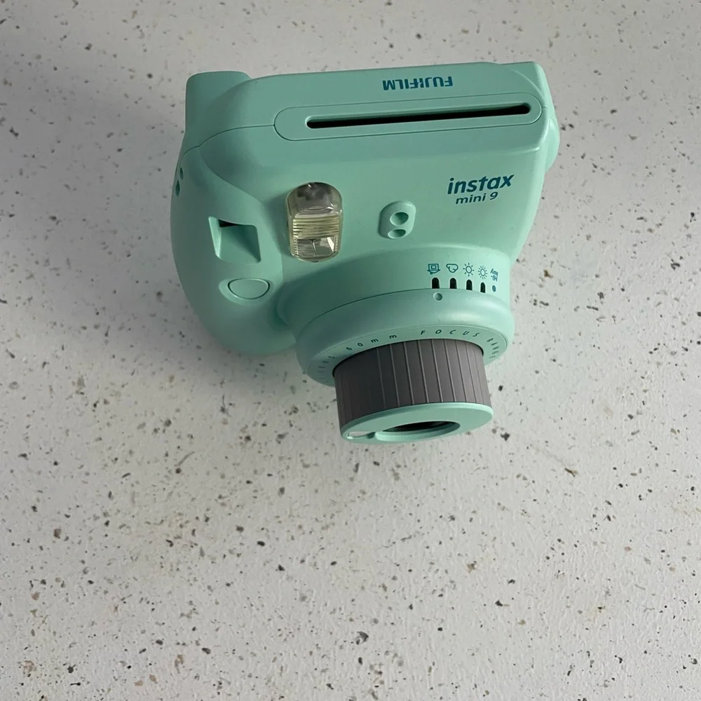 Instax camera with holder